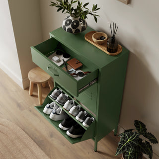 The Shoreditch shoe cabinet in forest with a top drawer, two lower shoe compartments and matching handles, styled in a hallway.